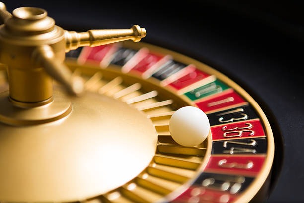 harmonibet mobile app interface showing live dealer table and game categories on Android phone