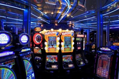 harmonibet app displaying live roulette and blackjack tables on iOS Safari browser